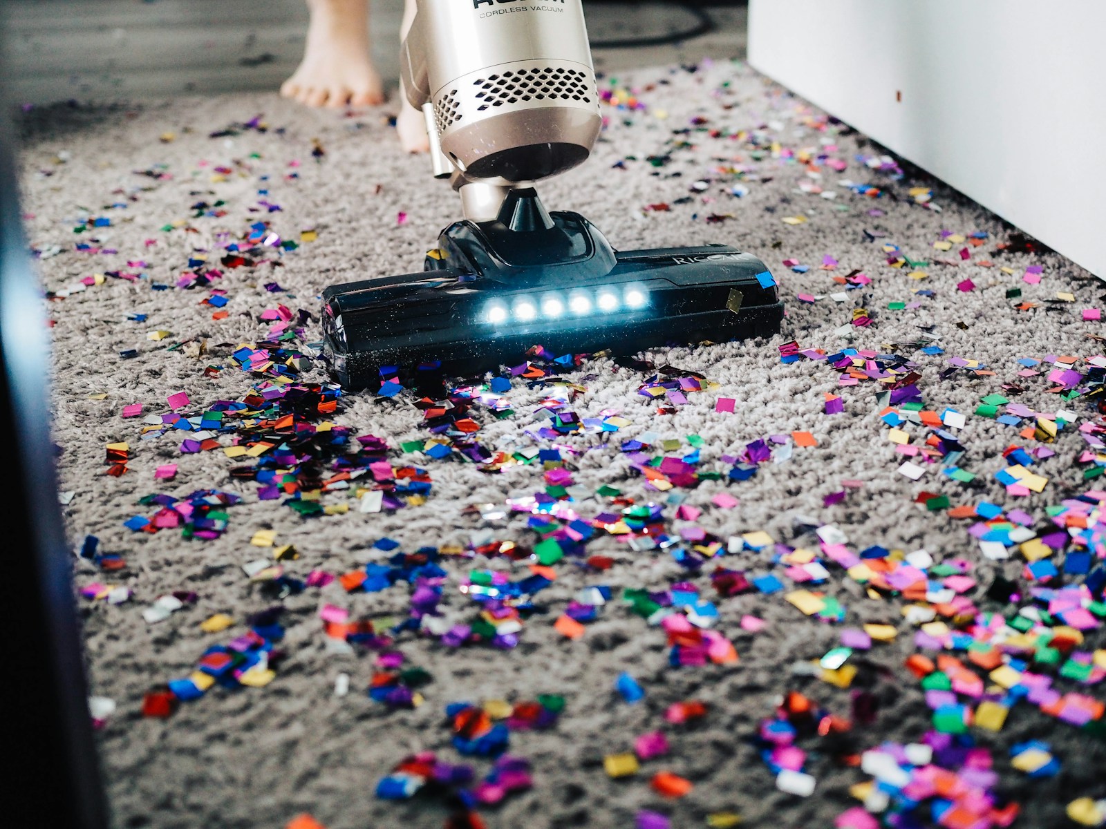 Professional cleaner preparing a bright home